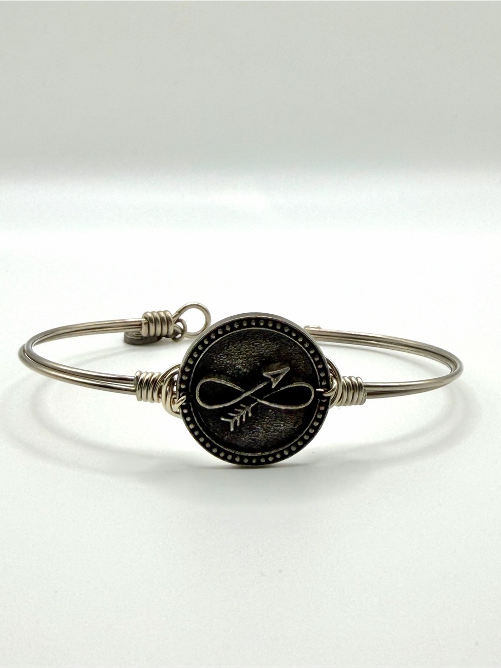 Luca + Danni Infinity Arrow Silver Tone Wire Bangle Bracelet + Pouch
